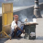03 - Man cooking on street